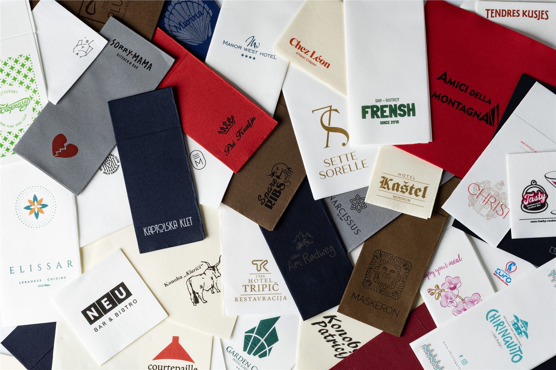 Editorial layout of personalized napkins in many colors