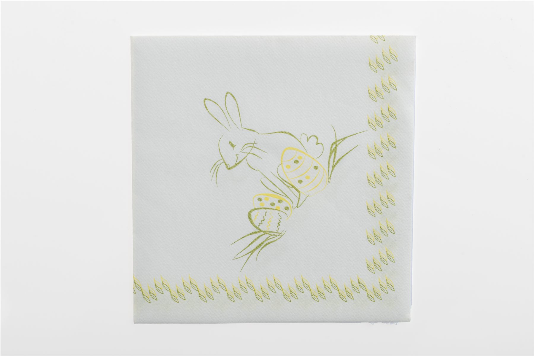 Napkin printed with a bunny and decorated eggs