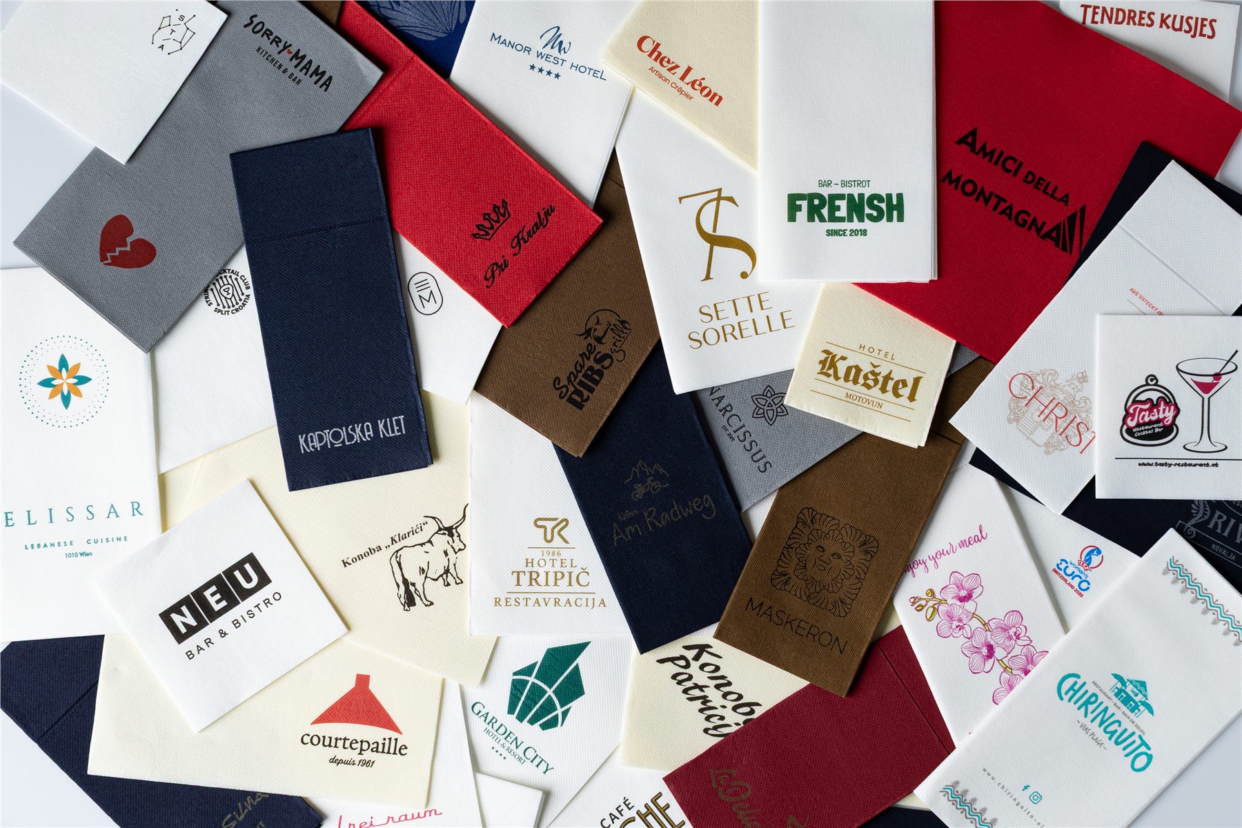 Overhead spread of dozens of personalized napkins
