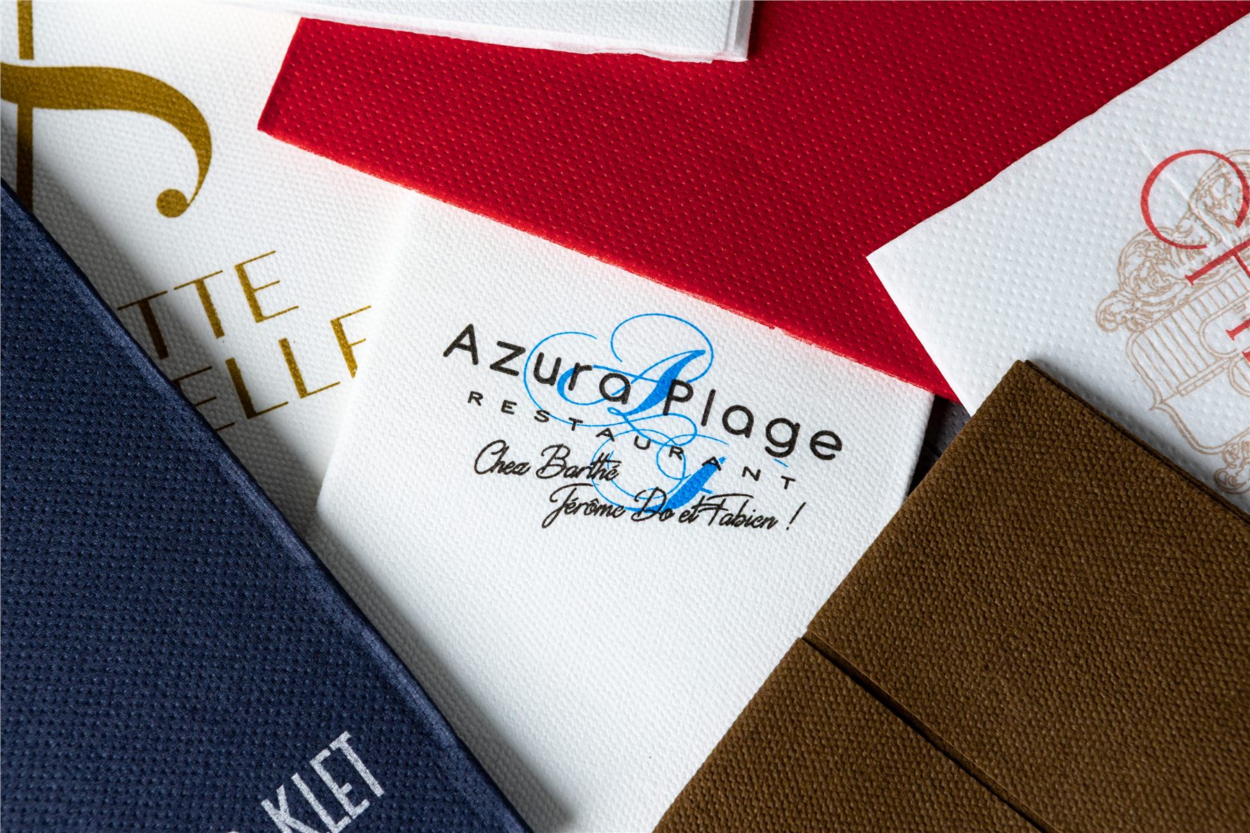 Close-up of a logo-printed napkin in white